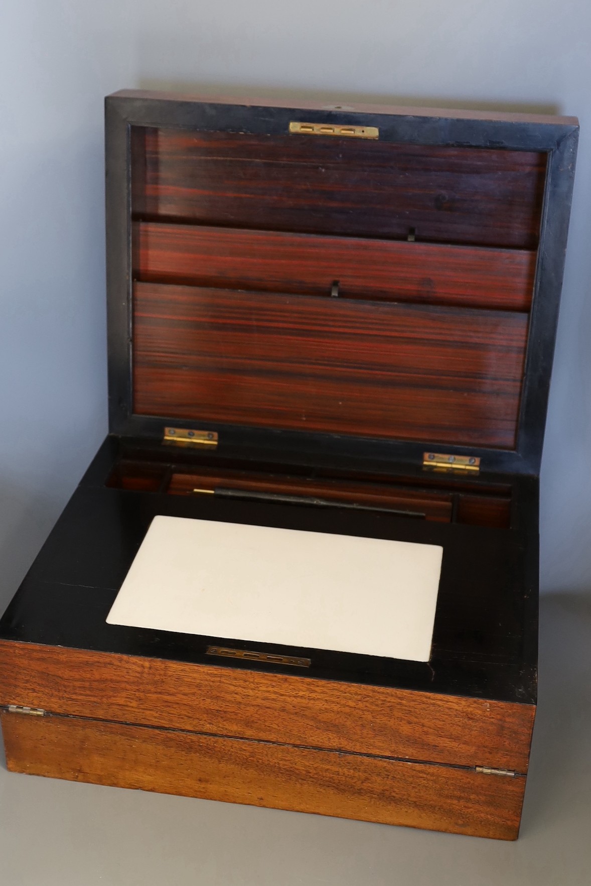 A 19 century mahogany and mother of pearl inlaid writing slope, 36cms wide x 18cms high